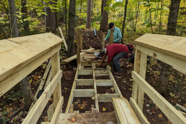 Volunteers build an 84-foot boardwalk. Photo by Patrick Gleissner.