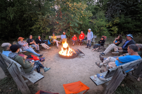 Volunteers and crew enjoying a bonfire. Photo by Patrick Gleissner.
